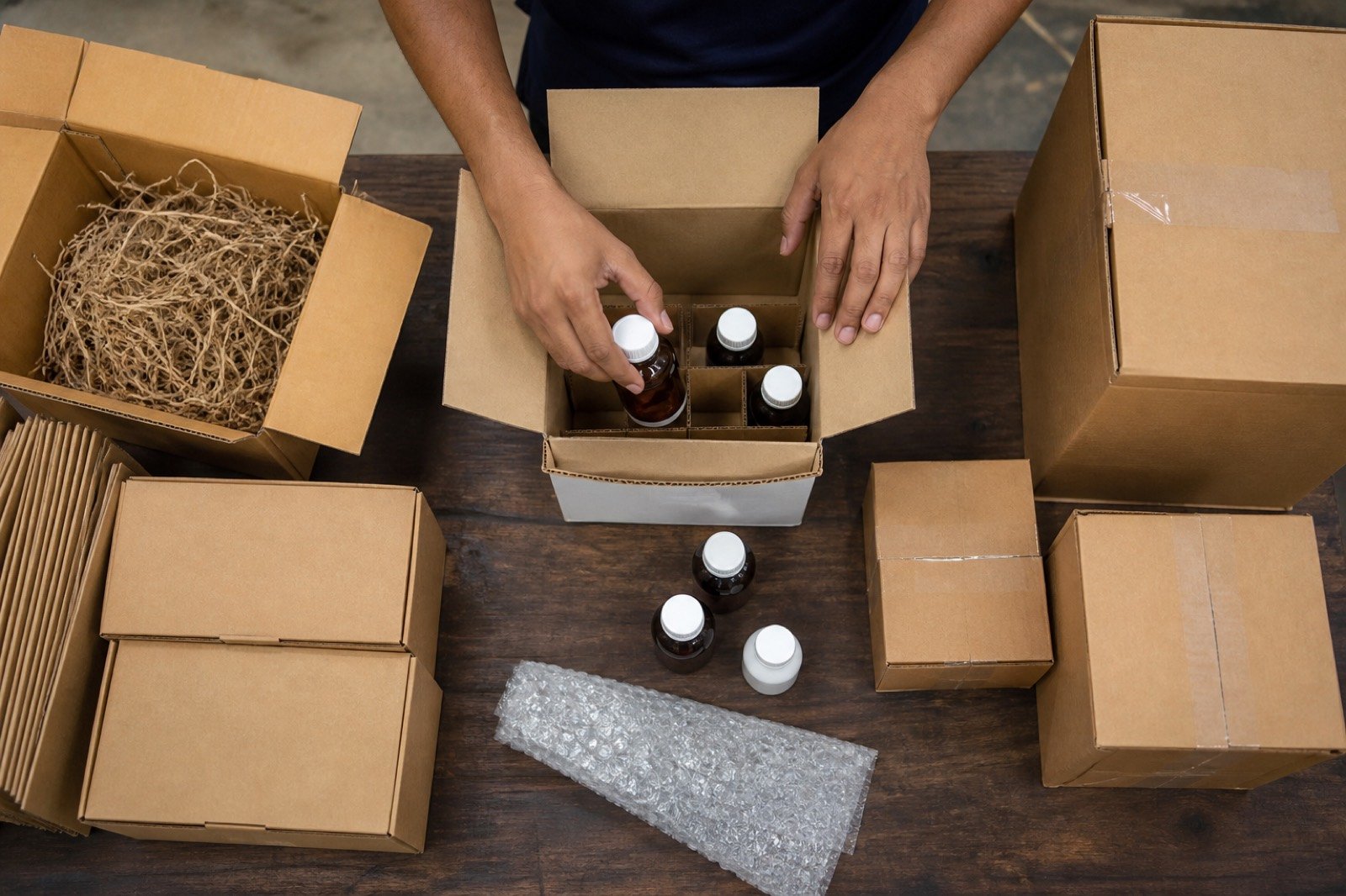 Packing cartons and chemical sample bottles for dispatch